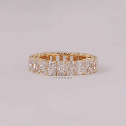 wedding band with emerald cut